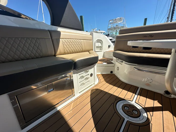  Yacht Photos Pics 2019 Sea Ray SLX 280 interior with luxurious seating and teak flooring.