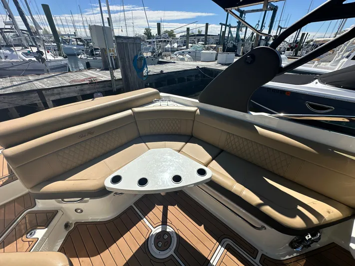  Yacht Photos Pics 2019 Sea Ray SLX 280 boat with tan seating and a dockside view.