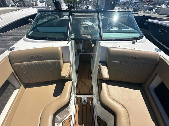  Yacht Photos Pics 2019 Sea Ray SLX 280 boat interior with tan seating and wood accents.
