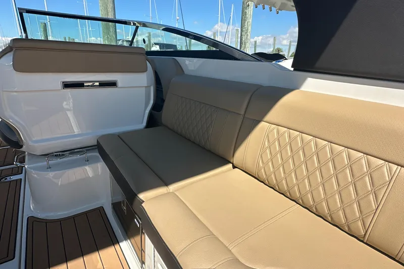  Yacht Photos Pics 2019 Sea Ray SLX 280 interior with tan leather seating and elegant design.