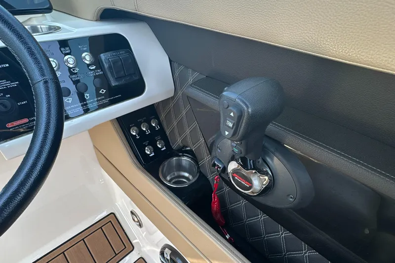  Yacht Photos Pics 2019 Sea Ray SLX 280 helm controls with throttle, switches, and cup holder.