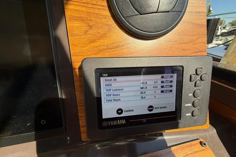 Getting There Yacht Photos Pics Yamaha display on 2023 Ranger Tugs R-25 showing trip data and settings.
