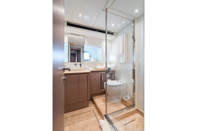 Yacht Photos Pics Luxurious bathroom on 2024 Sanlorenzo SX76 yacht with modern fixtures and elegant design.