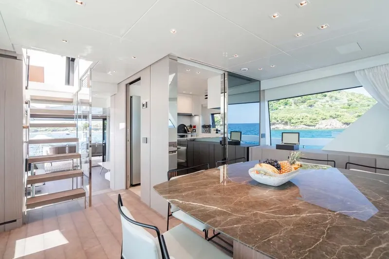  Yacht Photos Pics Luxurious interior of 2024 Sanlorenzo SX76 yacht with modern design and ocean view.