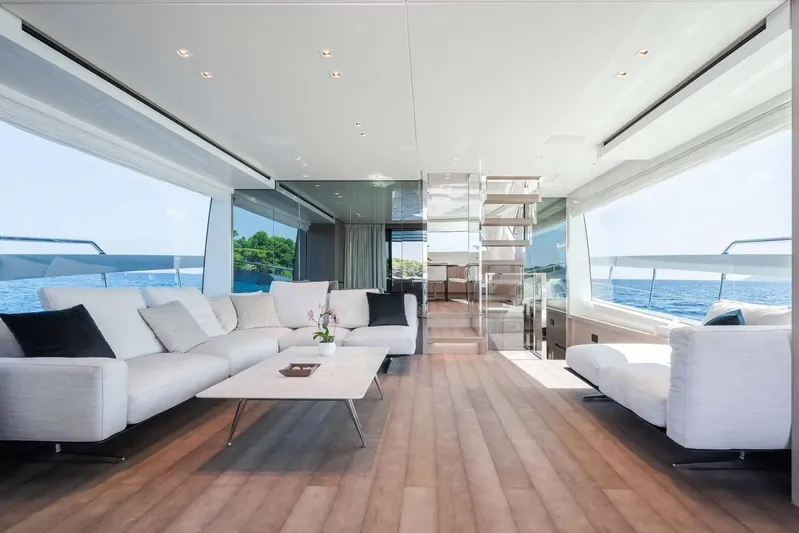  Yacht Photos Pics Luxurious interior of 2024 Sanlorenzo SX76 yacht with modern furnishings and ocean view.