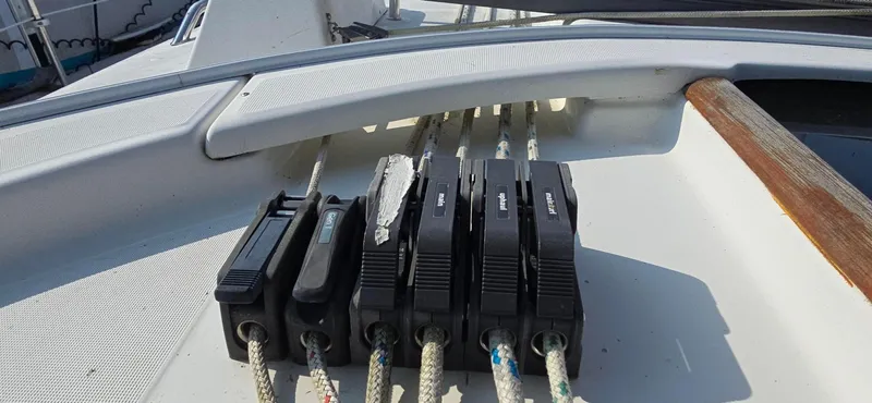 Lucy In The Sky Yacht Photos Pics Deck of 2001 Beneteau Oceanis 473 sailboat with rope clutches and lines.