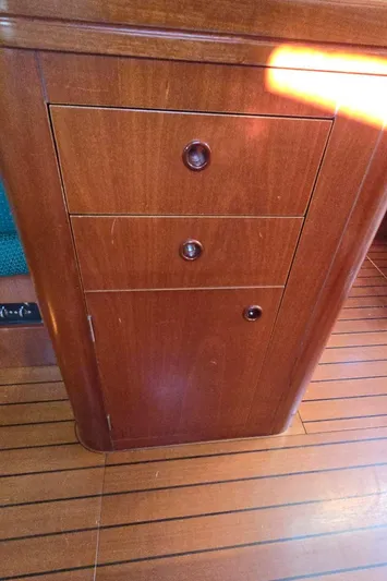 Lucy In The Sky Yacht Photos Pics Wooden cabinet with three drawers on a 2001 Beneteau Oceanis 473 sailboat.