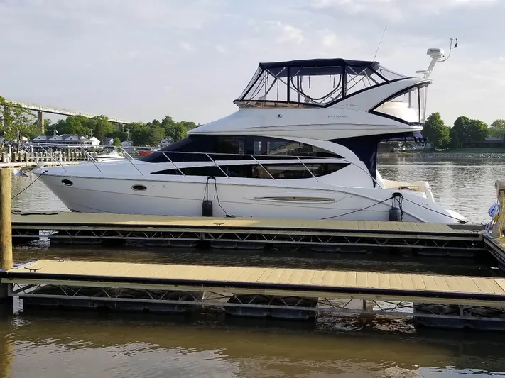  Yacht Photos Pics 2008 Meridian 391 Sedan yacht docked at a marina, side view.