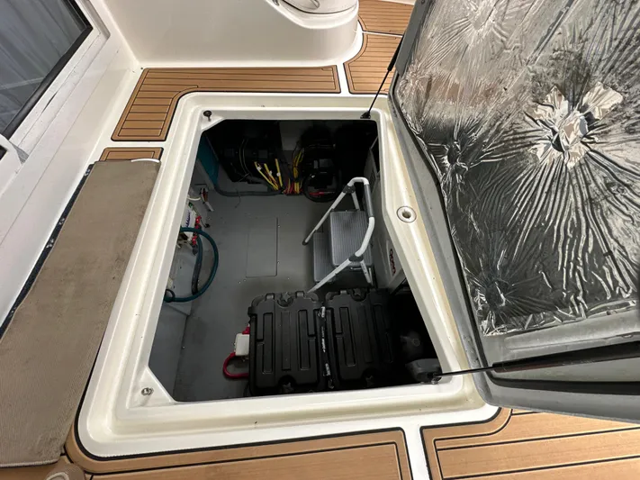  Yacht Photos Pics Engine compartment of 2008 Meridian 391 Sedan, showcasing interior components and storage.