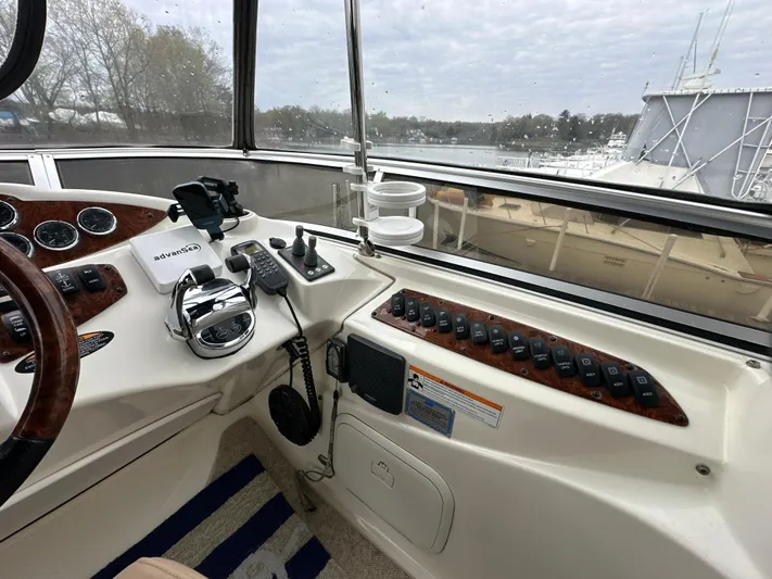  Yacht Photos Pics Helm of 2008 Meridian 391 Sedan yacht with controls and navigation equipment.
