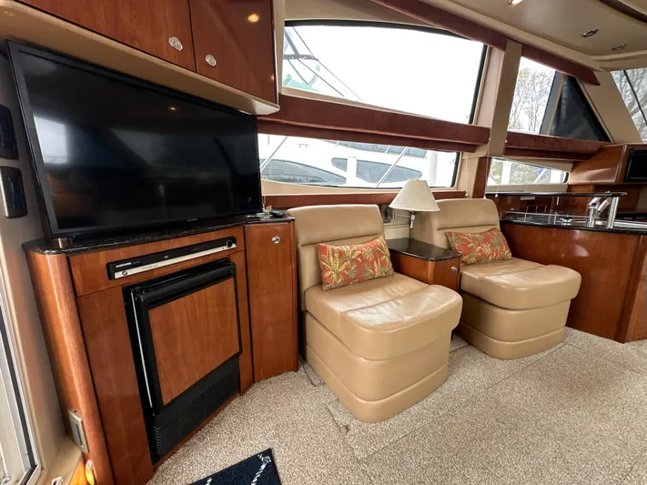  Yacht Photos Pics Luxurious interior of a 2008 Meridian 391 Sedan yacht with plush seating and modern amenities.