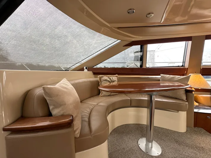  Yacht Photos Pics Luxurious interior of a 2008 Meridian 391 Sedan yacht with plush seating and elegant table.