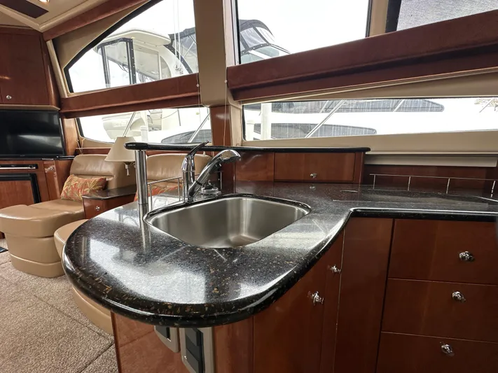  Yacht Photos Pics 2008 Meridian 391 Sedan yacht interior with sleek kitchen and modern amenities.