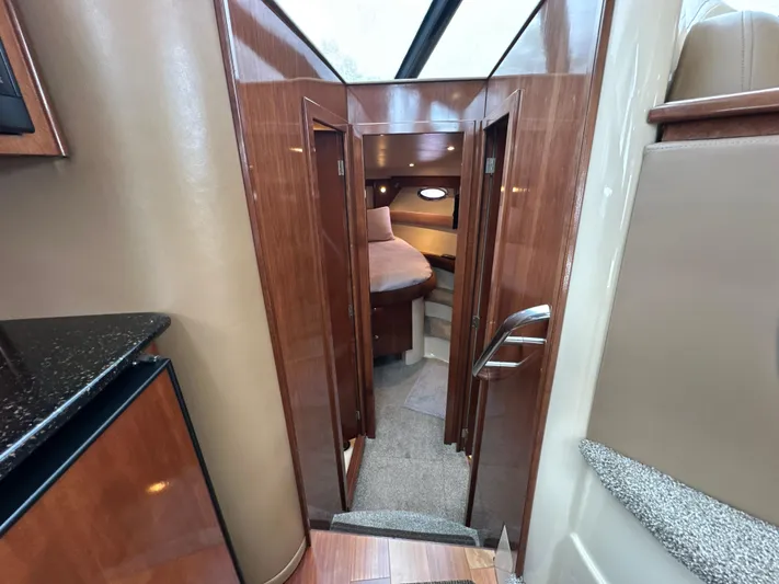  Yacht Photos Pics 2008 Meridian 391 Sedan interior with wood finish and cozy cabin view.