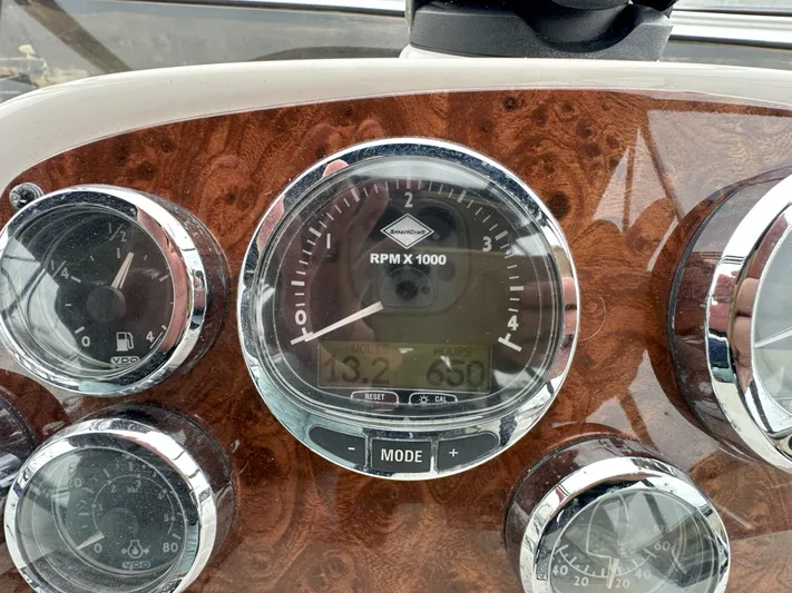  Yacht Photos Pics Dashboard of 2008 Meridian 391 Sedan with RPM gauge and wood finish.