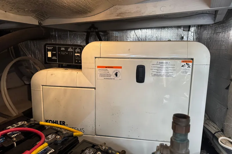 She's From Boston Yacht Photos Pics Engine room of 2003 Silverton 42 Convertible with Kohler power system.