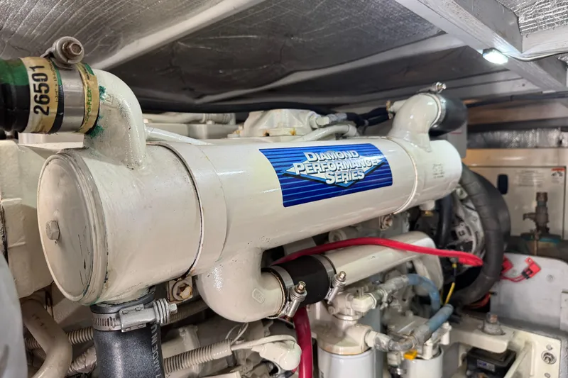 She's From Boston Yacht Photos Pics Engine room of a 2003 Silverton 42 Convertible with Diamond Performance Series engine.