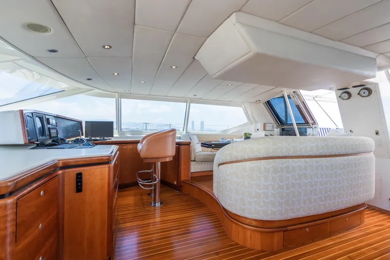Seaquell Yacht Photos Pics Luxurious interior of a 1992 Alloy Yachts sailboat with wooden flooring and modern furnishings.