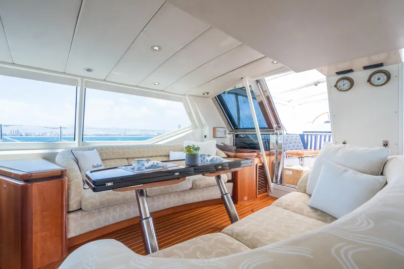 Seaquell Yacht Photos Pics Luxurious interior of a 1992 Alloy Yachts sailboat with plush seating and ocean view.