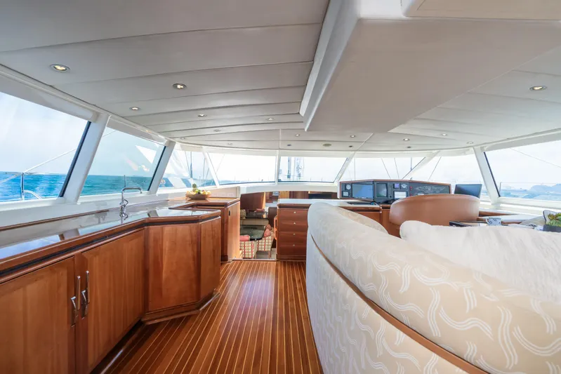 Seaquell Yacht Photos Pics Luxurious interior of a 1992 Alloy Yachts sailboat with panoramic windows.