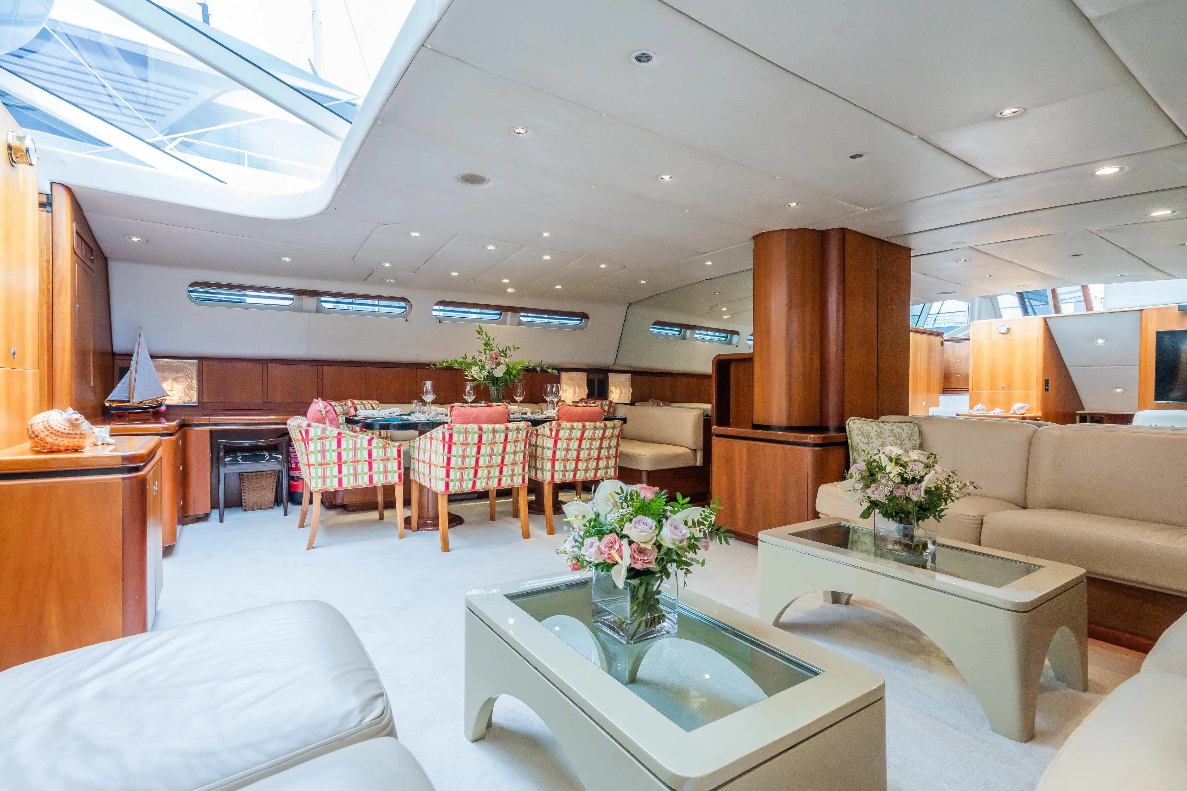Seaquell Yacht Photos Pics Luxurious interior of a 1992 Alloy Yachts sailboat with elegant dining and seating areas.