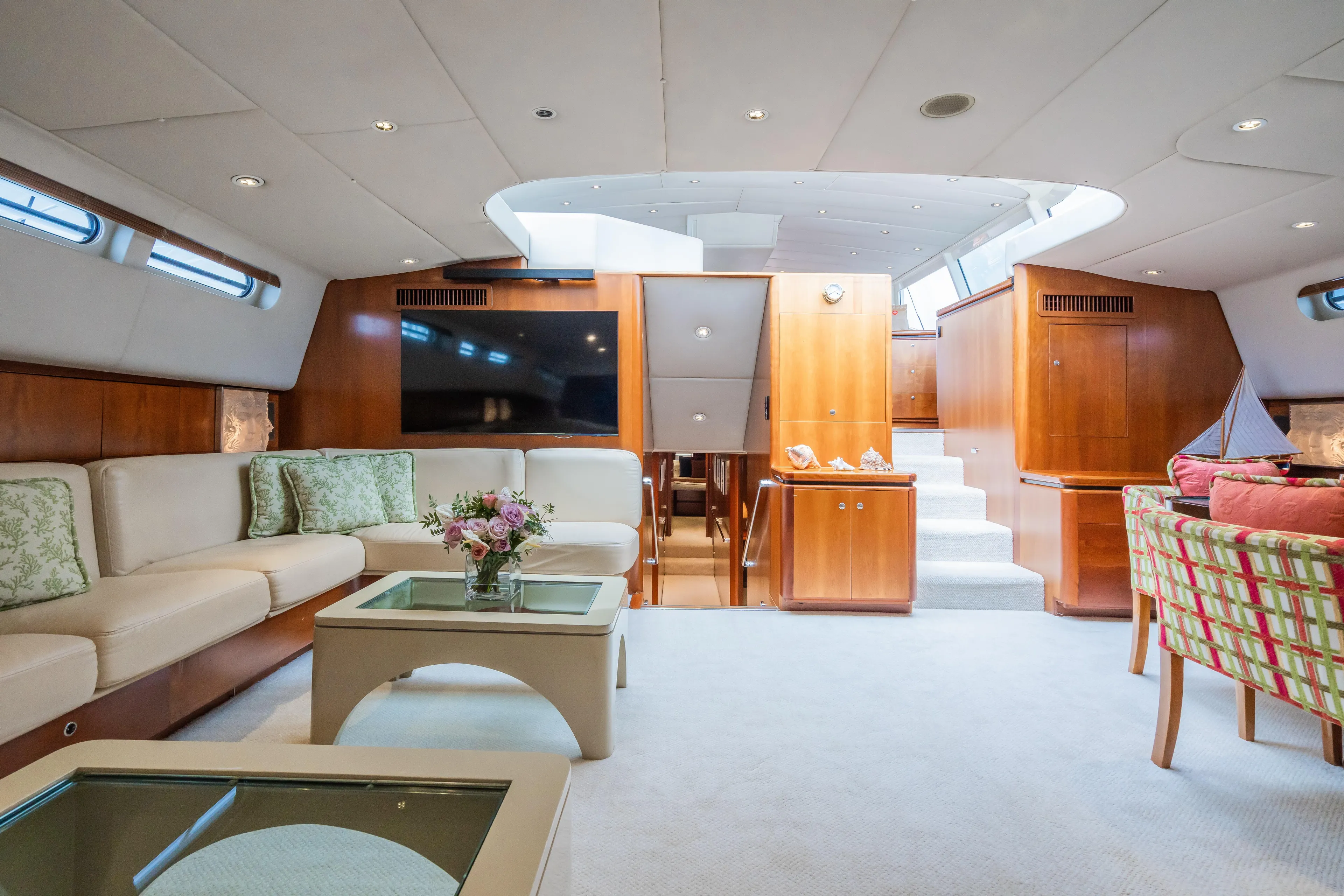 Seaquell Yacht Photos Pics Luxurious interior of a 1992 Alloy Yachts sailboat with modern furnishings and ample natural light.