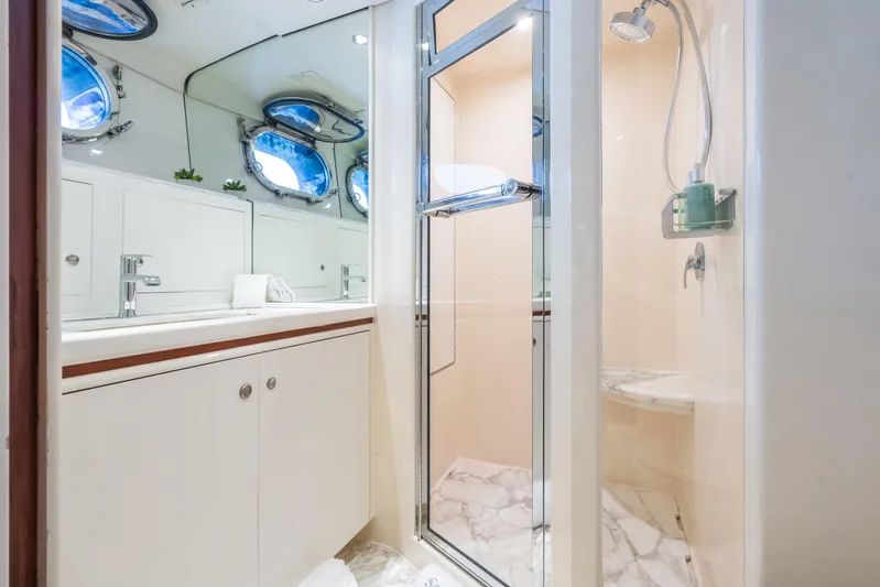 Seaquell Yacht Photos Pics Luxurious bathroom on a 1992 Alloy Yachts sailboat with shower and vanity.