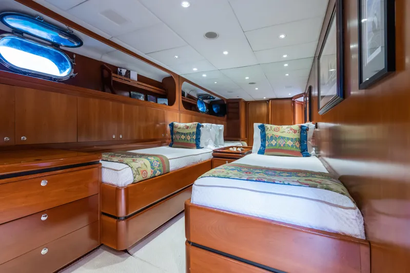 Seaquell Yacht Photos Pics Luxurious twin cabin interior of 1992 Alloy Yachts sailboat with wooden furnishings.