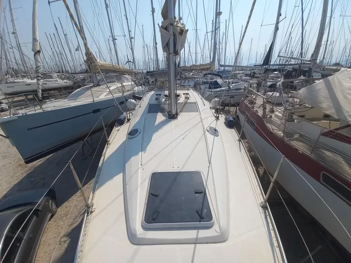  Yacht Photos Pics 2005 Elan Impression 434 sailboat docked in a crowded marina.