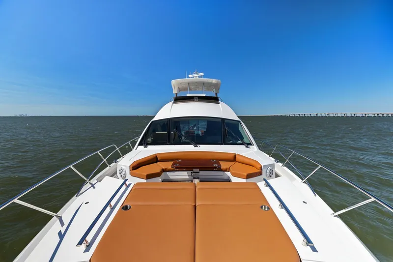 Rock Water Yacht Photos Pics 2013 Cheoy Lee 76 Alpha yacht on open water, featuring spacious deck and luxurious seating.