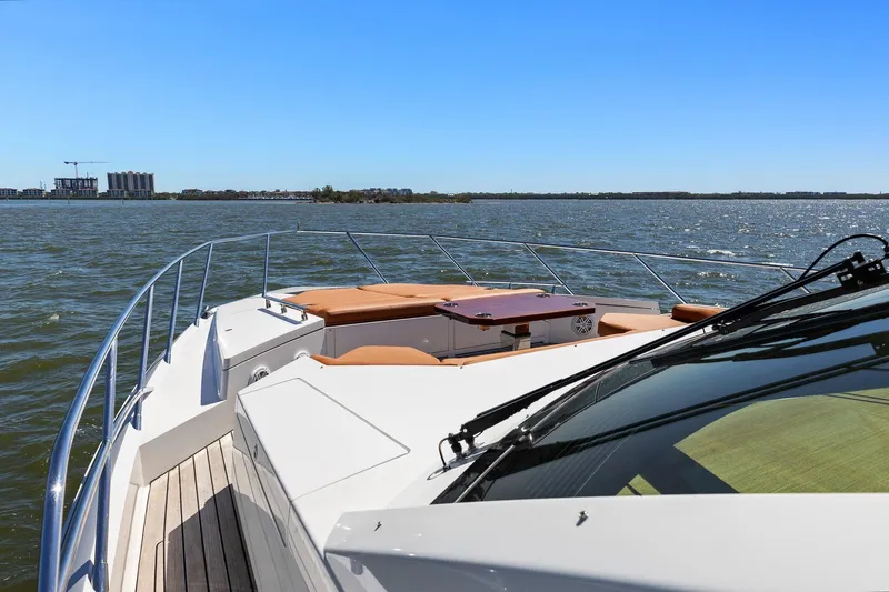 Rock Water Yacht Photos Pics Cheoy Lee 76 Alpha 2013 yacht cruising on a sunny day with clear blue skies.