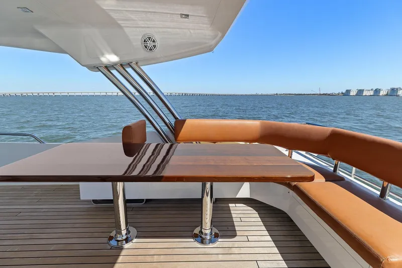Rock Water Yacht Photos Pics Luxurious 2013 Cheoy Lee 76 Alpha yacht deck with elegant seating and ocean view.