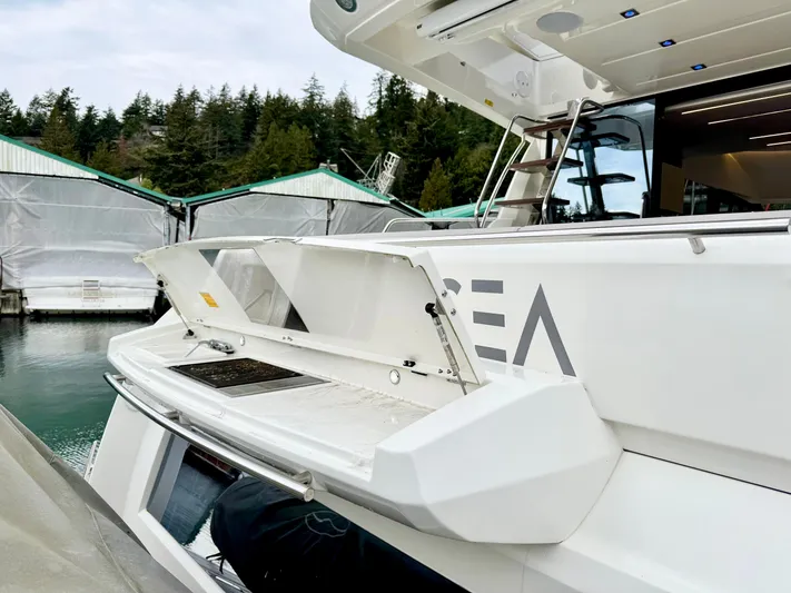 Seacresea Yacht Photos Pics 2019 Prestige 520 yacht docked, featuring open storage compartments and sleek design.