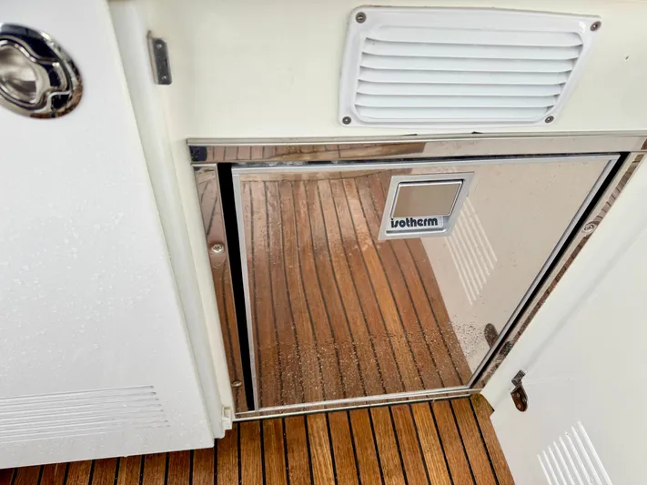 Seacresea Yacht Photos Pics Stainless steel door on 2019 Prestige 520 yacht with wooden deck flooring.