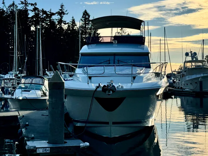 Seacresea Yacht Photos Pics Luxury 2019 Prestige 520 yacht docked at marina during sunset.