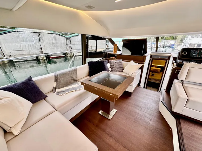 Seacresea Yacht Photos Pics Luxurious interior of 2019 Prestige 520 yacht with elegant seating and modern design.