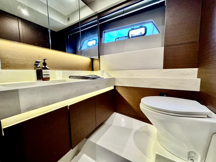 Seacresea Yacht Photos Pics Luxurious bathroom interior on a 2019 Prestige 520 yacht, featuring modern fixtures and elegant design.