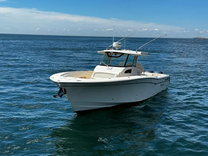 Katy Lady Yacht Photos Pics 2017 Grady-White Canyon 376 boat on open water under clear blue sky.