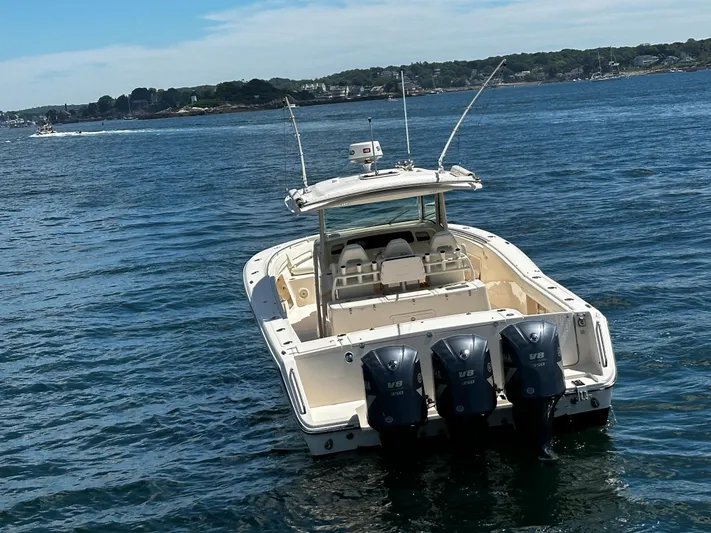 Katy Lady Yacht Photos Pics 2017 Grady-White Canyon 376 boat with triple Yamaha V8 engines on open water.