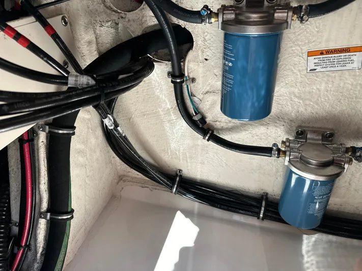 Katy Lady Yacht Photos Pics Engine compartment of 2017 Grady-White Canyon 376 with fuel filters and wiring.