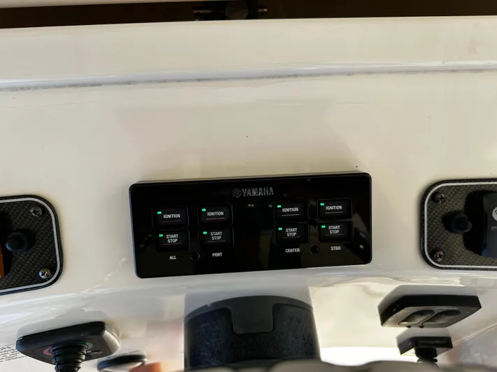 Katy Lady Yacht Photos Pics Control panel of a 2017 Grady-White Canyon 376 boat with Yamaha ignition switches.