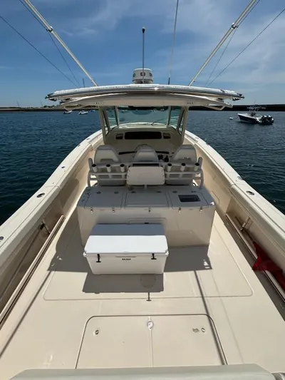 Katy Lady Yacht Photos Pics 2017 Grady-White Canyon 376 boat interior with seating and storage on open water.