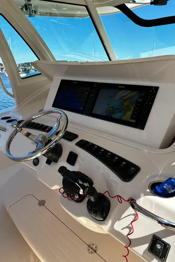 Katy Lady Yacht Photos Pics 2017 Grady-White Canyon 376 helm with dual navigation screens and steering wheel.