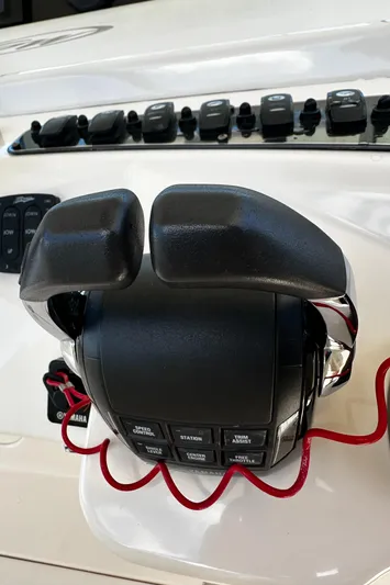 Katy Lady Yacht Photos Pics Throttle controls on a 2017 Grady-White Canyon 376 boat dashboard.