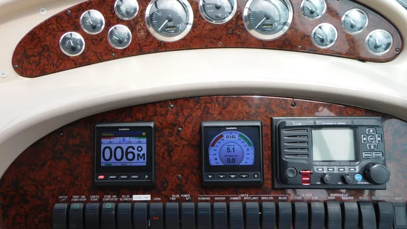  Yacht Photos Pics Control panel of a 2002 Sea Ray 380 Sundancer boat with gauges and navigation instruments.