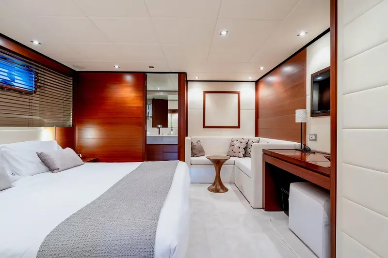  Yacht Photos Pics Luxurious interior of 2007 Baglietto 43 yacht with elegant bedroom and seating area.