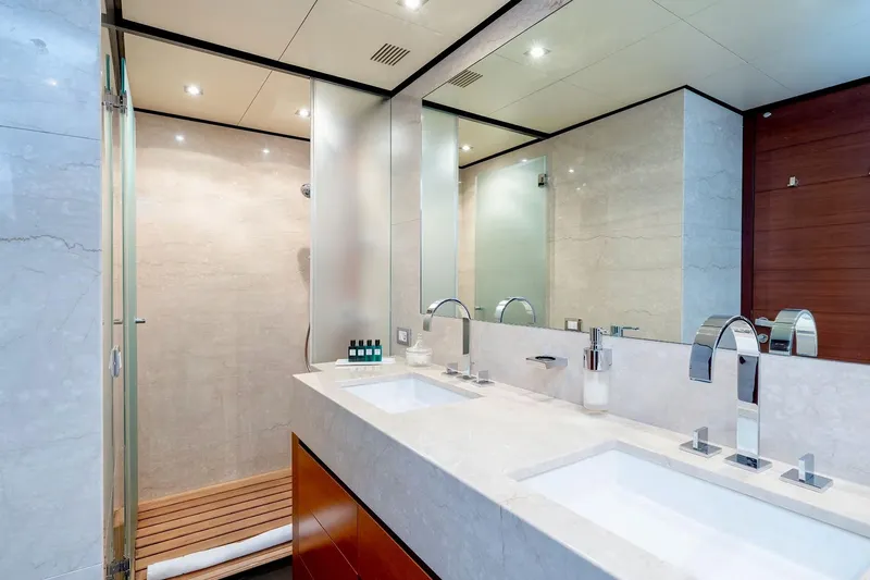  Yacht Photos Pics Luxurious bathroom on 2007 Baglietto 43 yacht, featuring dual sinks and modern shower.