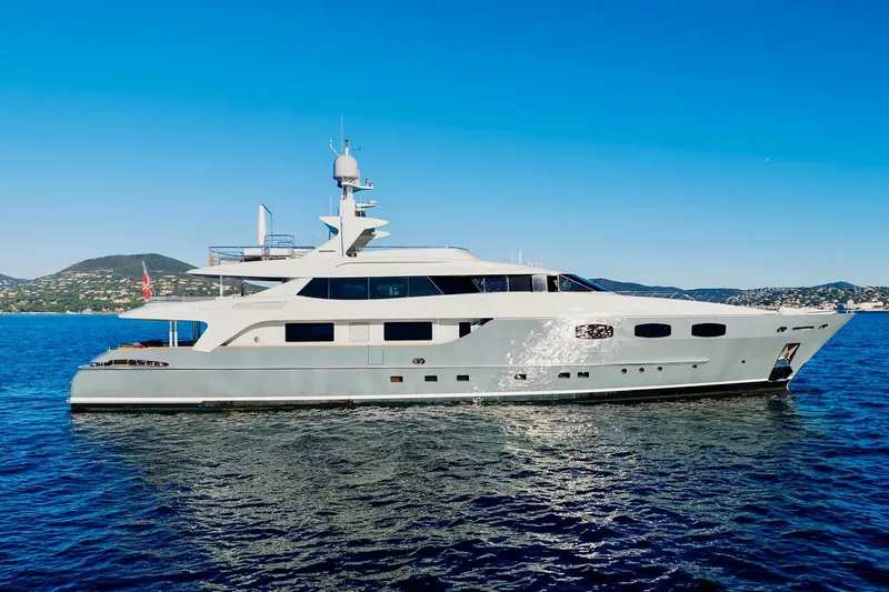  Yacht Photos Pics Luxury 2007 Baglietto 43 yacht cruising on clear blue waters.