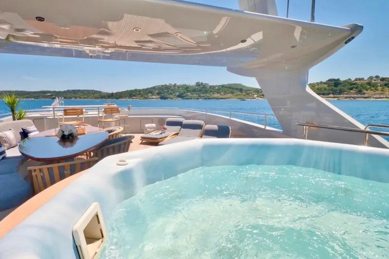  Yacht Photos Pics Luxurious 2007 Baglietto 43 yacht deck with jacuzzi and ocean view.