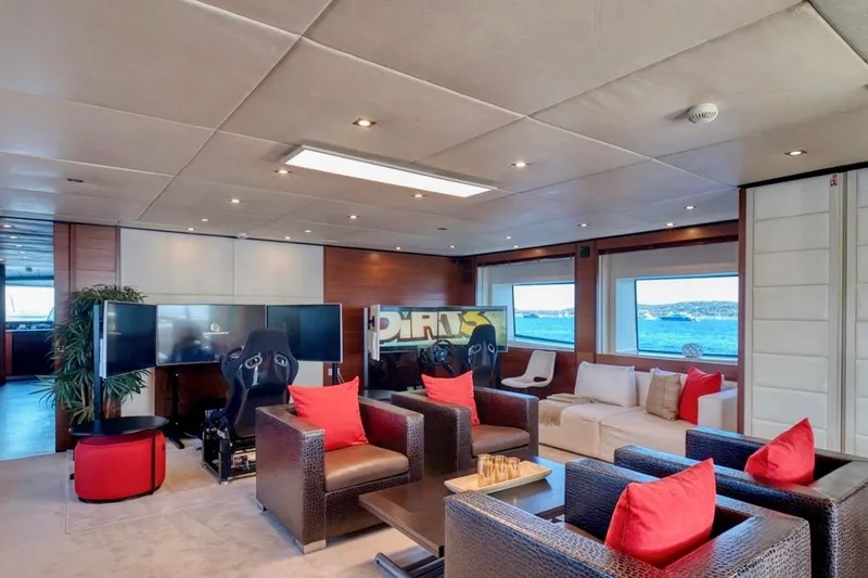  Yacht Photos Pics Luxurious interior of 2007 Baglietto 43 yacht with modern seating and entertainment area.